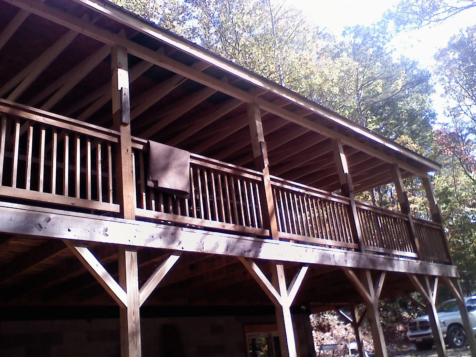Timber framing under a new elevated porch and deck — Roof Leak Repair in Waelder by Roofing Brothers